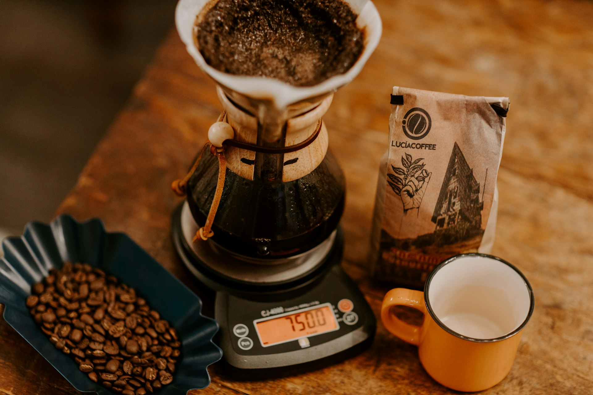 a coffee maker with a coffee cup